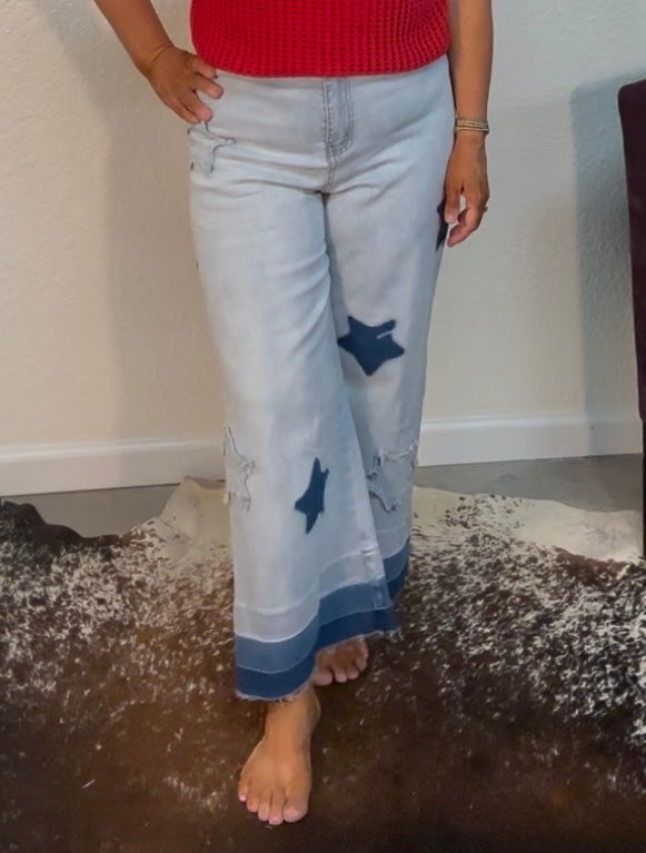 Mineral Washed Frayed Patch Jeans