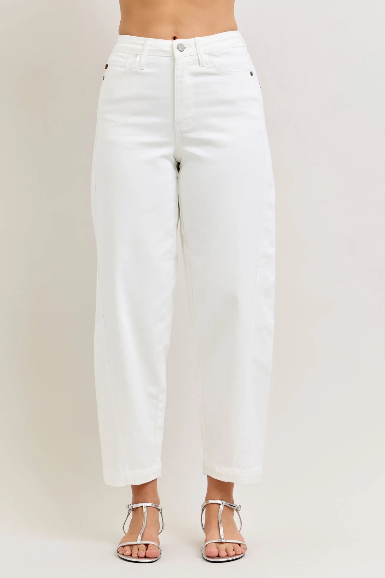 White jeans on a plain background